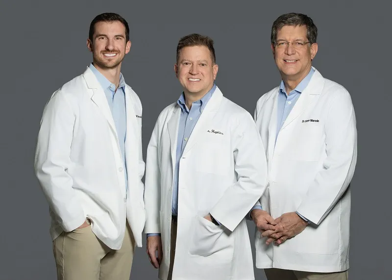 Three doctors posing